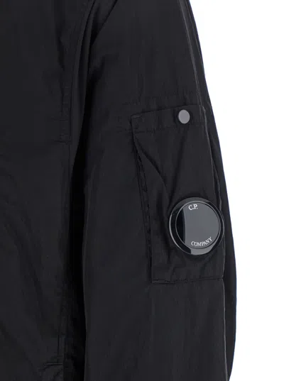 C.p. Company Black Jacket With Classic Collar And Logo Plaque On The Sleeve In Black