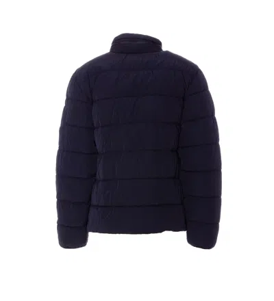 C.p. Company Blue Down Jacket With Fixed Hood And Logo Plaque On The Sleeve In Tech Fabric Man In Blue