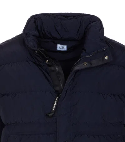 C.p. Company Blue Down Jacket With Fixed Hood And Logo Plaque On The Sleeve In Tech Fabric Man In Blue