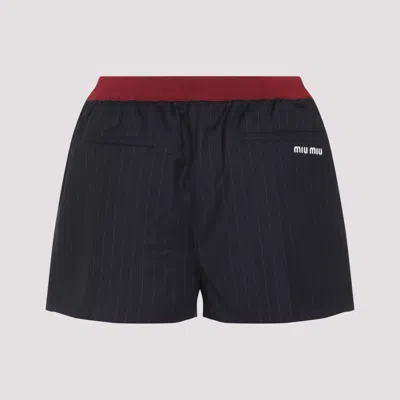 Miu Miu Virgin Wool Pinstriped Shorts In Black
