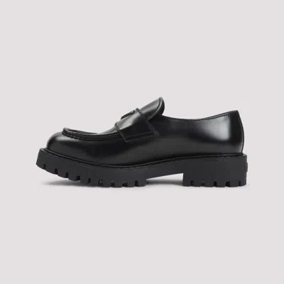 Prada Polished Black Leather Loafers With Chunky Rubber Sole