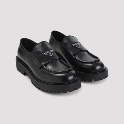 Prada Polished Black Leather Loafers With Chunky Rubber Sole