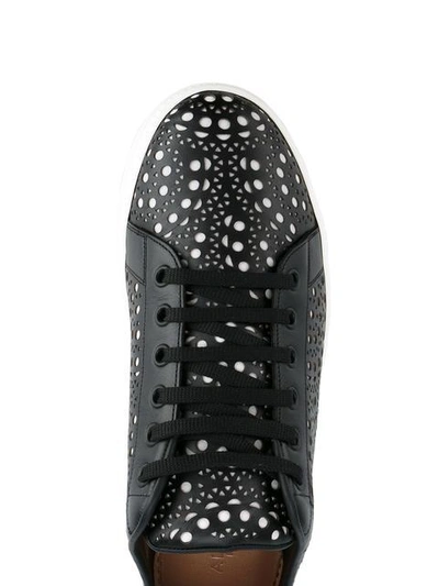 Shop Alaïa Perforated Sneakers In Black