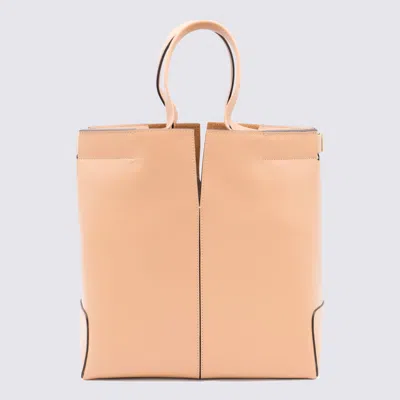 Tod's Light Pink Leather Totes