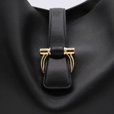 Ferragamo Buckle Strap Soft Structure Shoulder Bag In Black