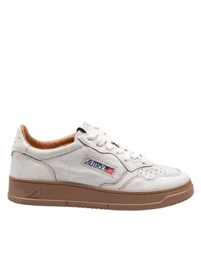 Autry Low Top Leather Sneakers With Perforated Round Toe In White