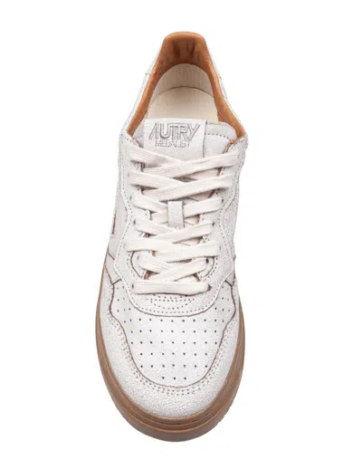 Autry Low Top Leather Sneakers With Perforated Round Toe In White