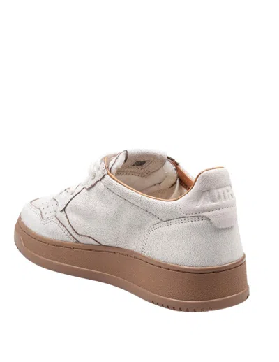 Autry Low Top Leather Sneakers With Perforated Round Toe In White