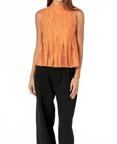 2.7 August Apparel Burnout Pleated Sleeveless Top In Orange In Orange