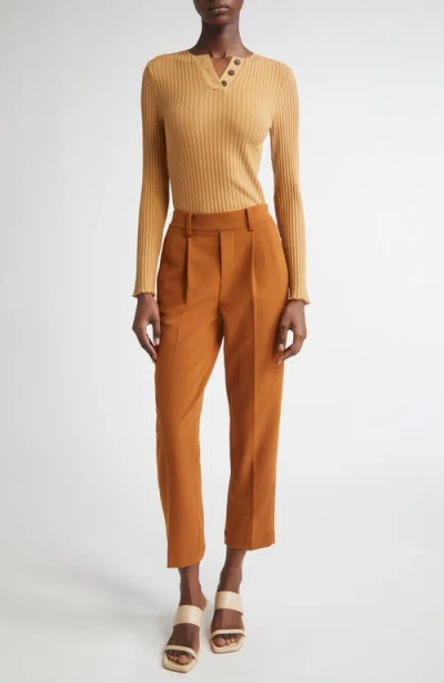Vince Pleated Pull-on Tapered Leg Pants In Orange
