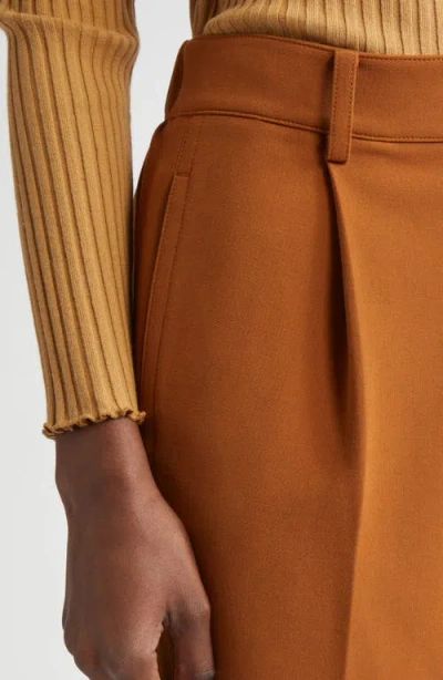 Vince Pleated Pull-on Tapered Leg Pants In Orange
