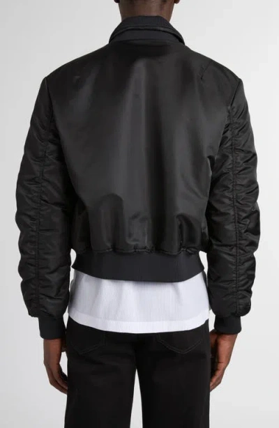 Alexander Mcqueen Mcqueen Technical Crop Bomber Jacket In Black