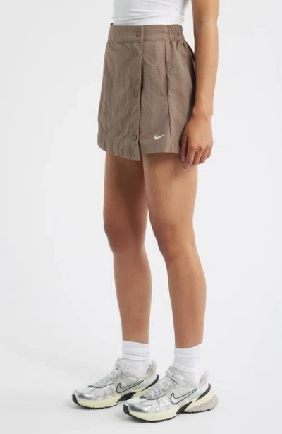 Nike Sportswear Essential Water Repellent Woven Skort In Gray