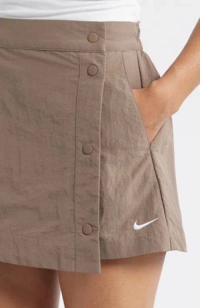 Nike Sportswear Essential Water Repellent Woven Skort In Gray