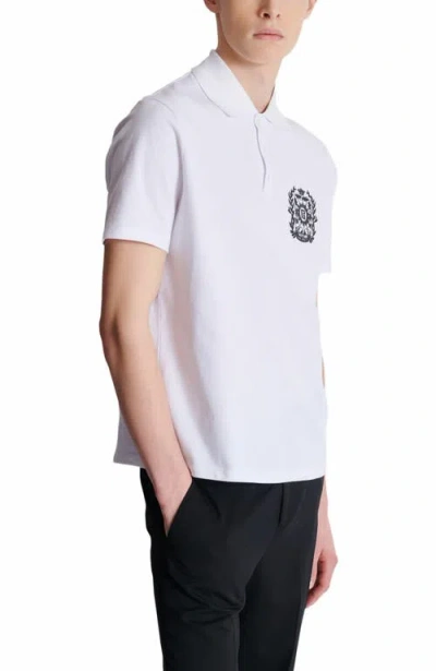 Balmain Cotton Crest Print Polo Shirt In White