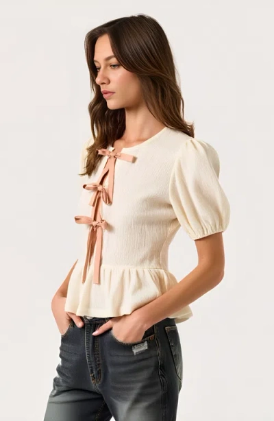 Modenaire Puff-sleeve Peplum Blouse With Bow-tie Front Detail