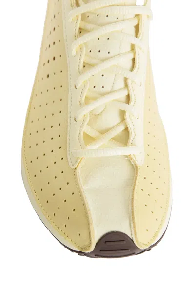 Nike Air Superfly Perforated Running Sneakers In Yellow