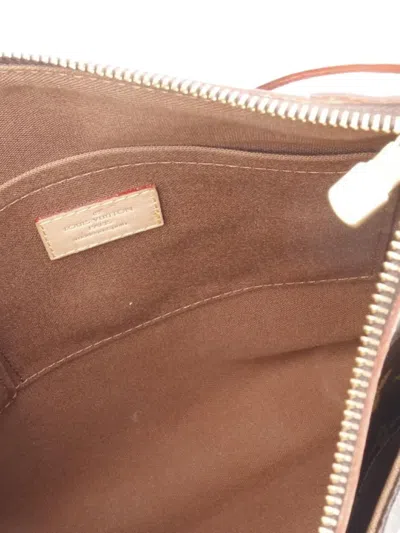 Pre-owned Louis Vuitton 2011 Odeon Pm Monogram Shoulder Bag In Brown