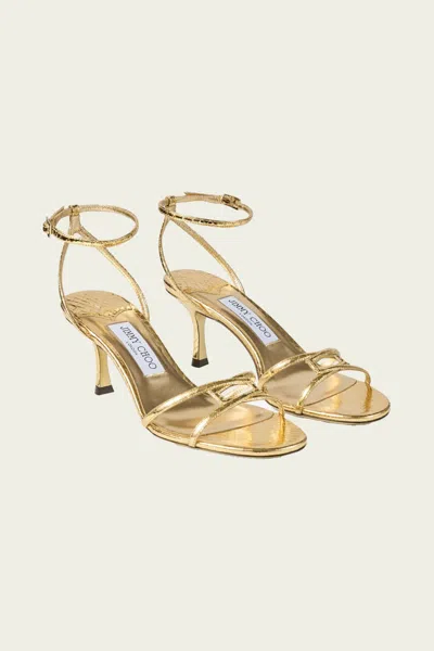 Jimmy Choo Leo 65 Candy Wrap Leather Sandals In Gold In Gold