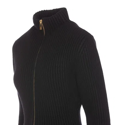 Alaïa Ribbed Wool And Cashmere-blend Peplum Cardigan In Black