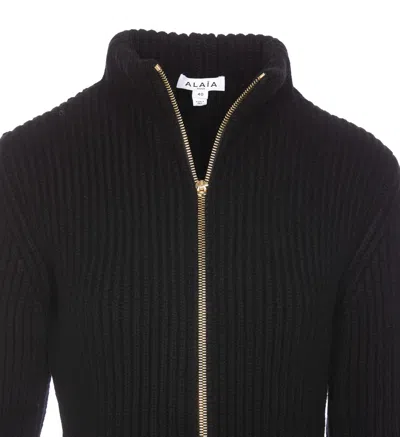 Alaïa Ribbed Wool And Cashmere-blend Peplum Cardigan In Black
