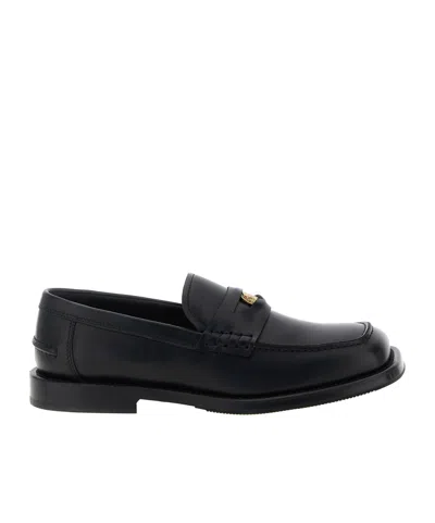 Moschino Strap Penny Round Toe Loafers In Black