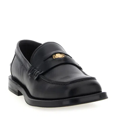 Moschino Strap Penny Round Toe Loafers In Black