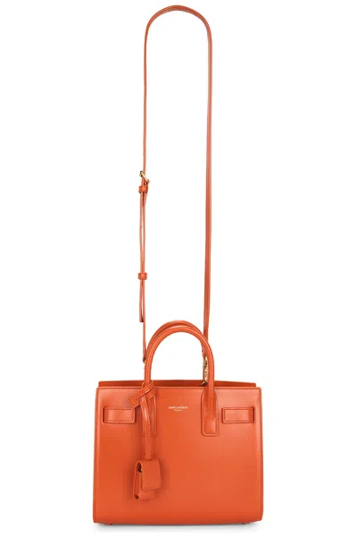 Saint Laurent Sac De Jour Nano Top-handle Bag In Smooth Leather In Orange
