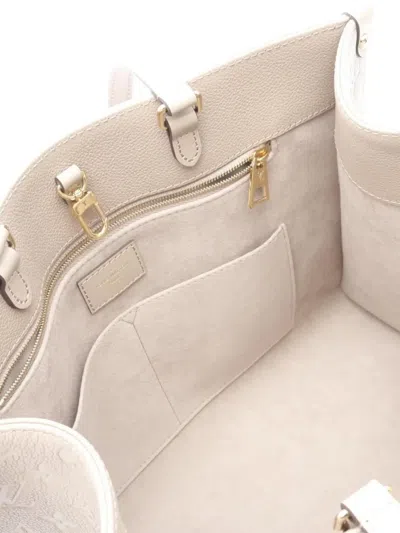 Pre-owned Louis Vuitton 2021 On-the-go Mm Monogram Shoulder Bag In Neutral