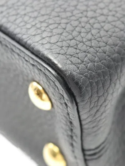 Pre-owned Louis Vuitton 2021 Mini Capucines Leather Handbag In Black