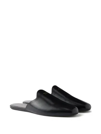 Prada Embossed-logo Leather Mules In Black