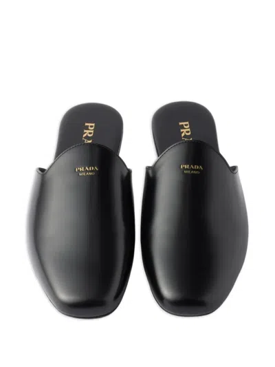 Prada Embossed-logo Leather Mules In Black