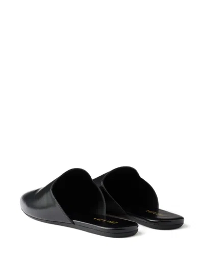 Prada Embossed-logo Leather Mules In Black