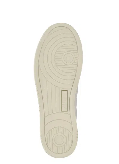 Autry Leather Low-top Sneakers With Perforated Toe Box In White