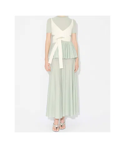 Alaïa Virgin Wool Peplum Top In Blue