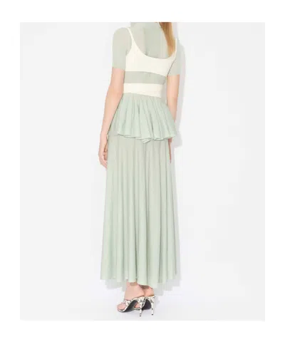 Alaïa Virgin Wool Peplum Top In Blue