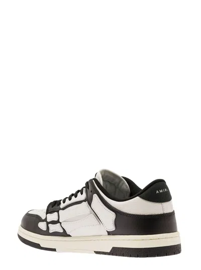 Amiri Skel Top Low White And Black Sneakers With Skeleton Patch In Leather Man