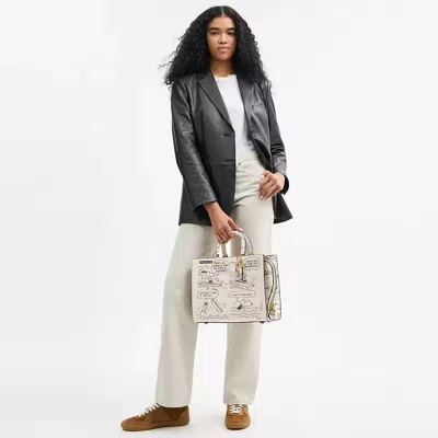 Coach X Peanuts Rogue Bag With Newspaper Print