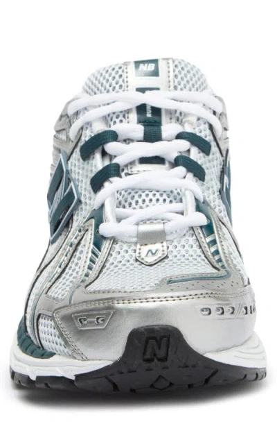 New Balance Gender Inclusive 1906r Running Shoe