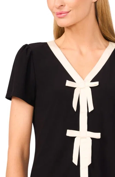 Cece By Cynthia Steffe Cascading Ruffle Knit Top In Black
