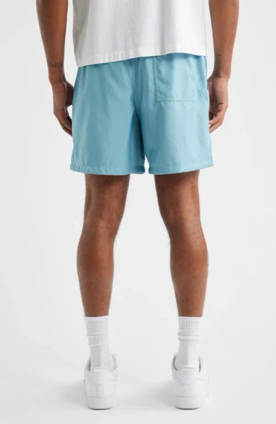 Nike Club Woven Flow Shorts In Blue