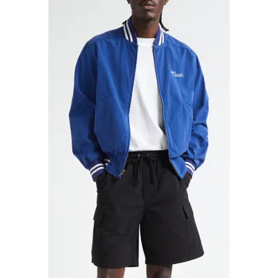 Noah Cotton Varsity Jacket In Blue