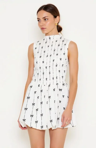 Modenaire Sleeveless Smocked Mini Dress With High Neckline