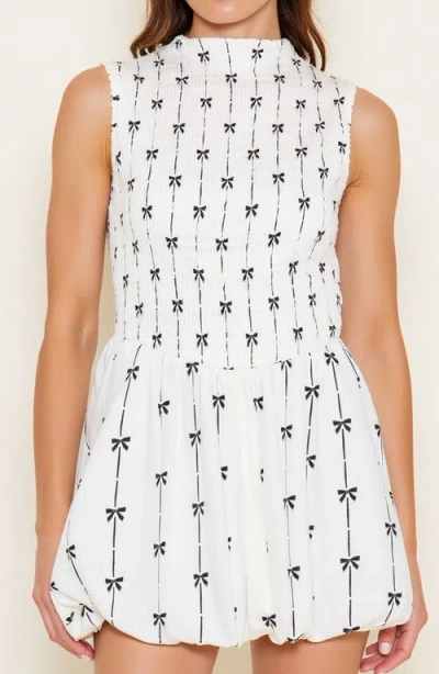Modenaire Sleeveless Smocked Mini Dress With High Neckline