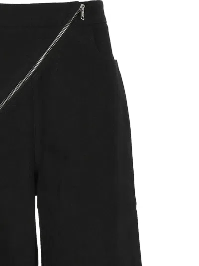Alaïa Womens Noir Alaia Spiral Two-patch-pockets Wide-leg High-rise Denim-blend Trousers In Black