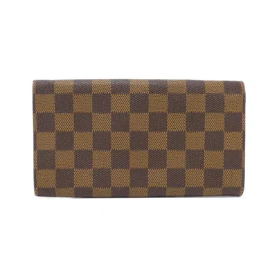 Pre-owned Louis Vuitton Damier Ebene Coated Canvas Long Wallet (bi-fold) () In Brown