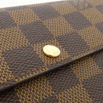 Pre-owned Louis Vuitton Damier Ebene Coated Canvas Long Wallet (bi-fold) () In Brown