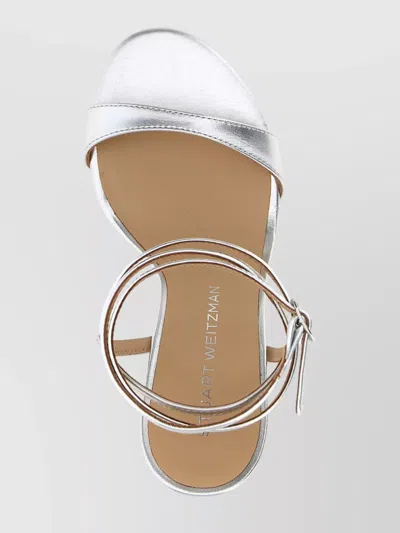 Stuart Weitzman Metallic Buckle Wrap Sandals In Silver