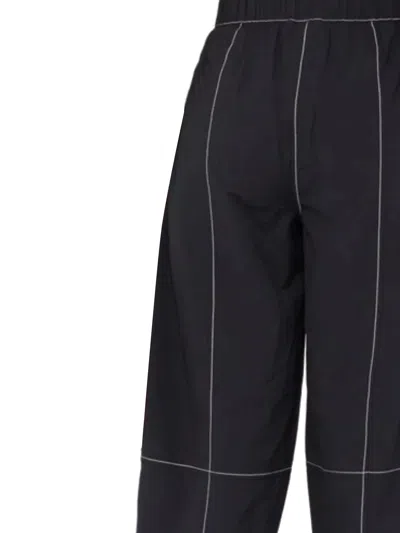 Ganni Womens Black Curved-leg Mid-rise Organic Cotton-blend Trousers