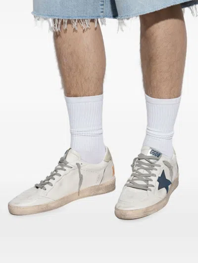 Golden Goose Distressed Low-top Sneakers With Star Detail And Vintage Aesthetic